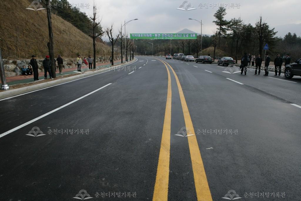 석사동 대우아파트-동면 만천리간 4차선 개통 이미지