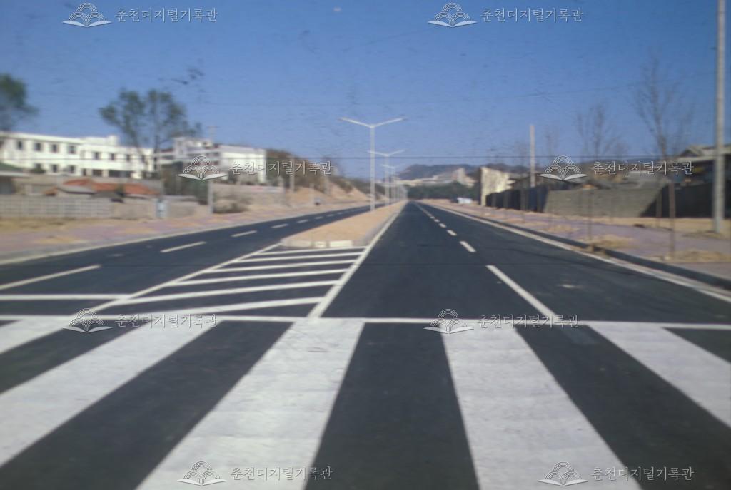 효자동 강원대학교 정문 진입로 확장 공사 전 후 이미지